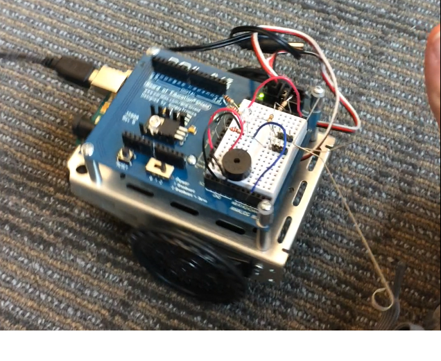 A robot built to detect walls and move away from them using Arduino code and wisker wires.